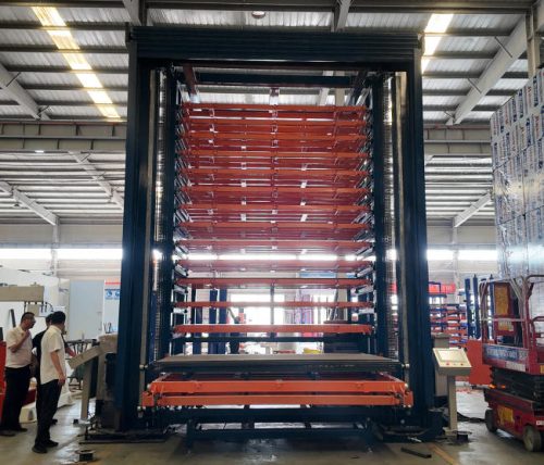 Loading/unloading system for fiber laser