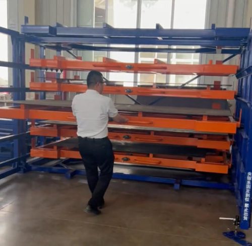 Drawer-type storage system of sheet and plate material for laser cutter