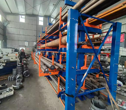 Roll out dual sided cantilever type rack