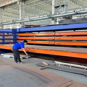 Storage System Featuring Roll-Out Levels for Storing Sheet Steel