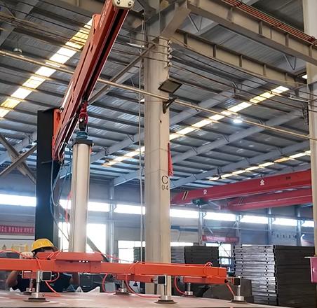 Pneumatic Vacuum Manipulator for Metal Sheets: Column-Mounted Lifting System